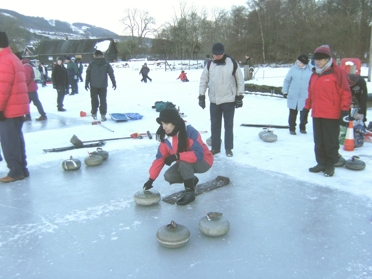 Janice Young prepares to deliver stone